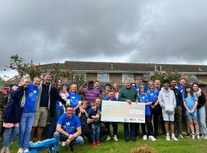 Maidenhead Spurs supporters' club make charity donation to DEBRA UK